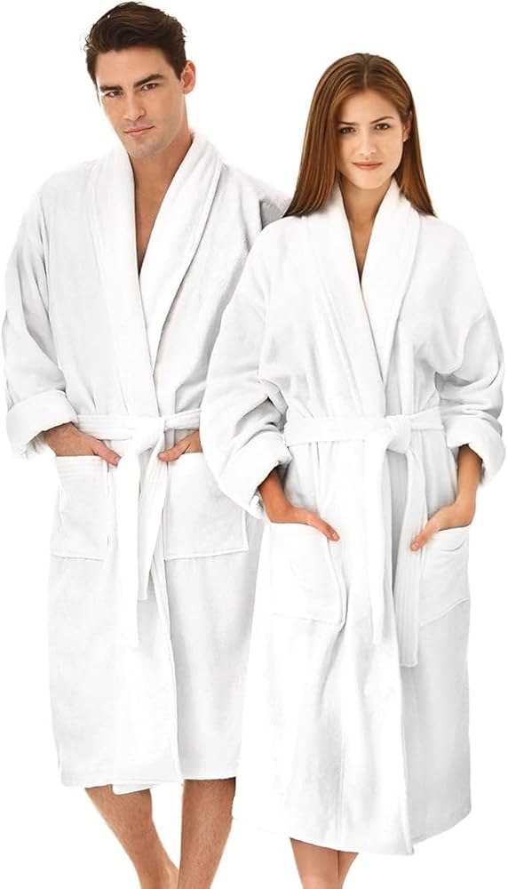 A man and woman, both smiling softly at the camera, stand side by side in BRIT DIAMOND Luxury Cotton Bathrobes—ultra-soft, lightweight robes featuring adjustable belts and pockets—perfect for everyday comfort.