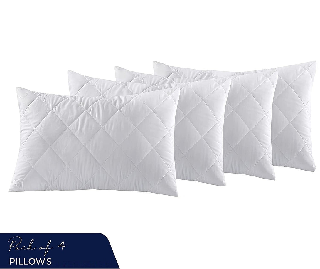 Four BRIT DIAMOND Luxury Quilted Hollow Fibre Pillows, extra soft and anti-allergic, are arranged in two rows on a white background. A dark blue label reads “Pack of 4 PILLOWS.” These pillows offer bounce back and breathable comfort.