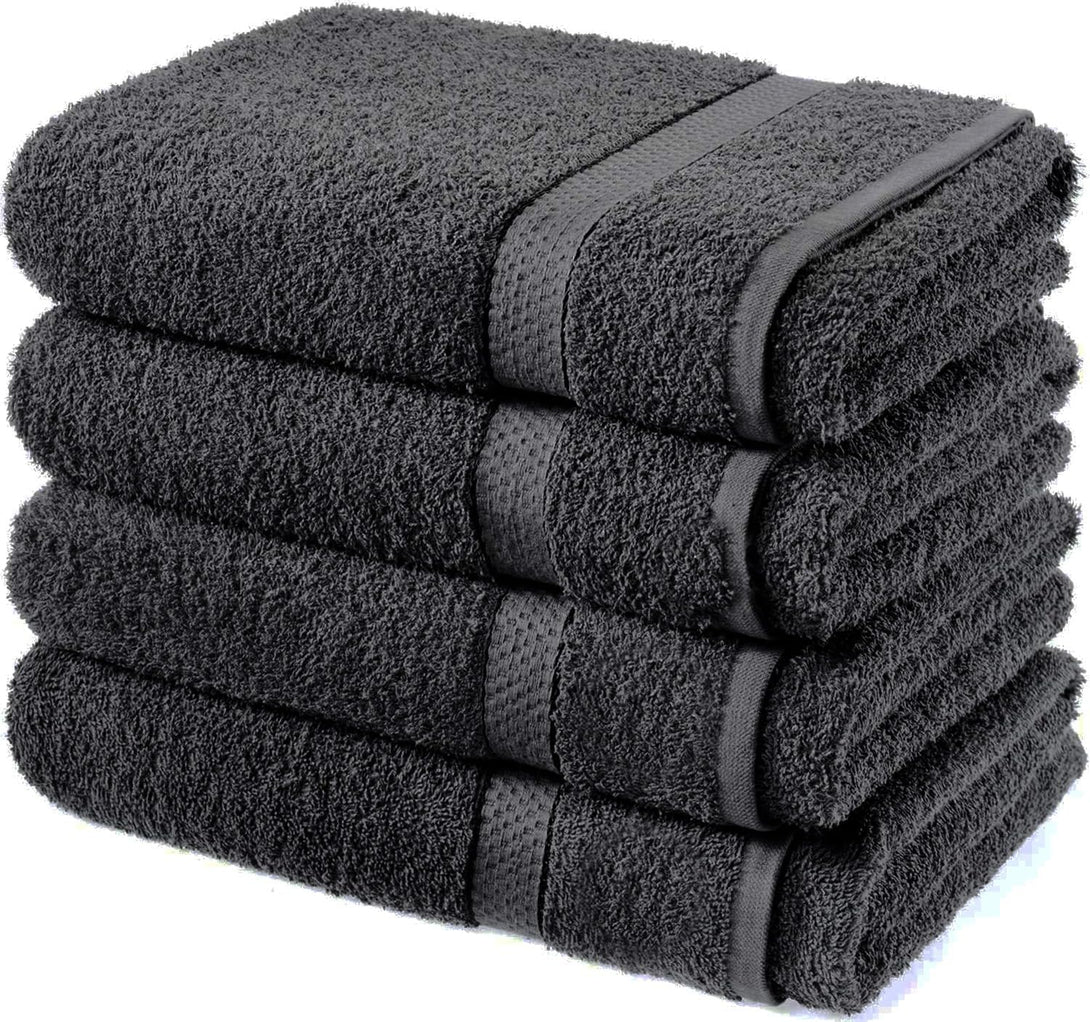 Four BRIT DIAMOND 100% cotton bath sheets in dark gray are stacked against a white background, highlighting their soft, absorbent, and quick-drying properties. Available in packs of 2 or 4 and multiple colors.