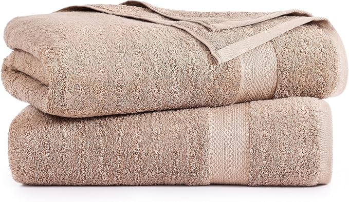 Two BRIT DIAMOND 100% cotton bath sheets are stacked, one with a visible textured border and a corner fold, showcasing the ultra-soft, quick-dry towels from the Pack of 2 – ideal for spa, gym, guest, or bathroom use.