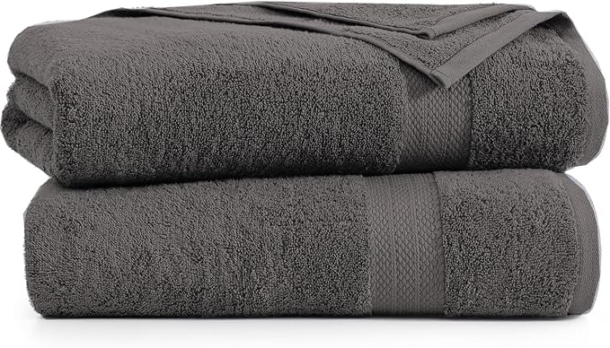 Two BRIT DIAMOND 100% cotton premium bath sheets (pack of 2), large, dark gray, are neatly folded with textured bands visible against a white background—quick-dry, ultra soft, and highly absorbent for spa or bathroom use.