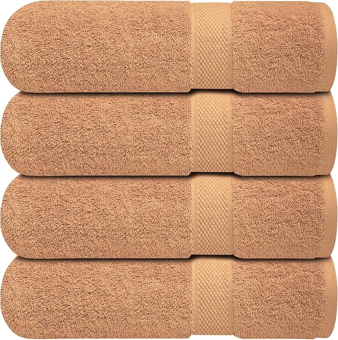 A set of 4 BRIT DIAMOND Soft & Absorbent Bath Sheets, made from 100% cotton, neatly stacked to display their textured surface and patterned bands—perfect for a quick drying experience. Available in multiple colours.