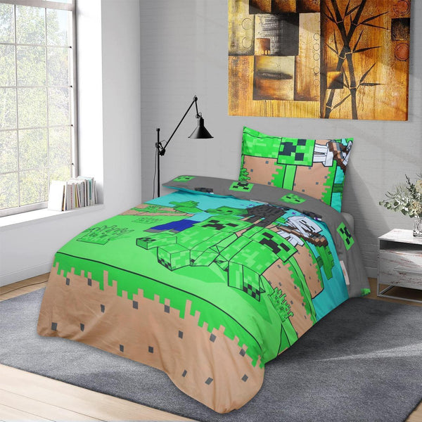 A twin bed in a bright kids’ room features the BRIT DIAMOND Kids Minecraft Reversible Duvet Cover Set and pillowcase, with green and brown gamer bedding, a large window, abstract art, floor lamp, nightstand, vase, and books.