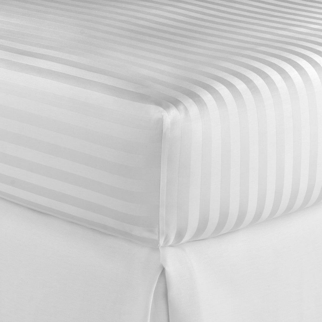 Close-up of a BRIT DIAMOND Stripe Extra Deep Fitted Sheet, 100% Egyptian Cotton (400TC), shown in Double or King size. Its subtle stripe pattern hugs the mattress snugly for a crisp, clean look.
