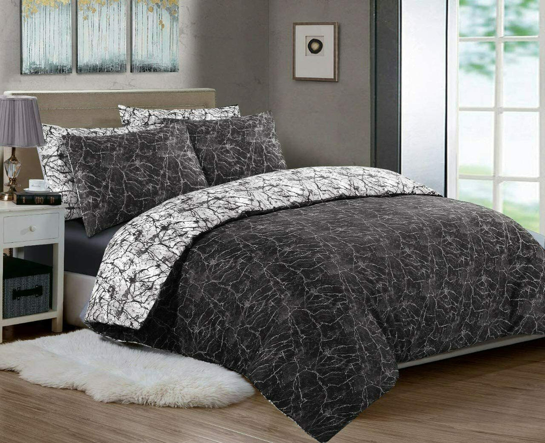 A bedroom with a BRIT DIAMOND Reversible Duvet Cover Set in 100% cotton (200TC), double or super king size, featuring a marble print, matching pillows, a nightstand with lamp, white rug, wall art, and large window letting in natural light.