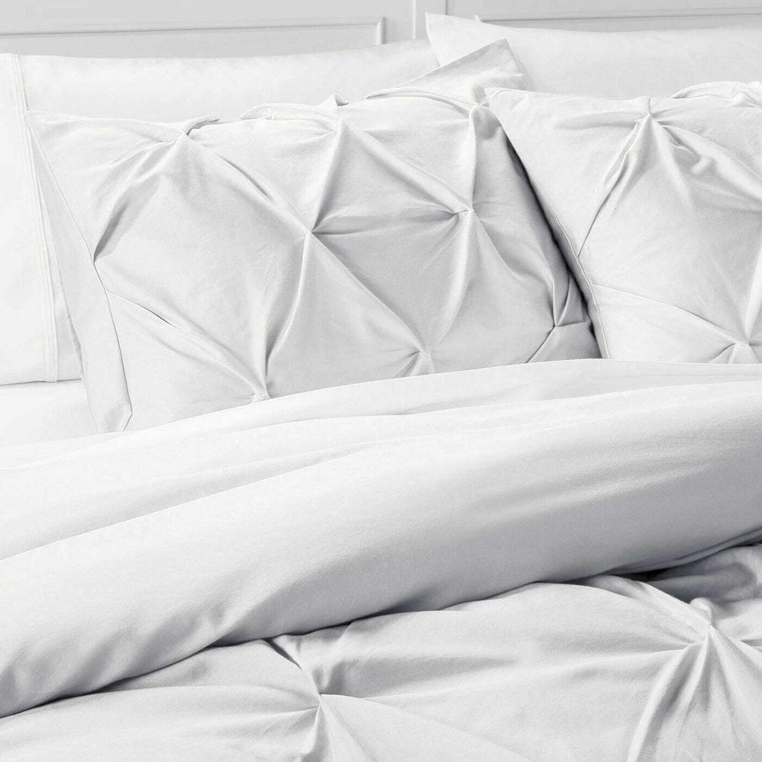 The BRIT DIAMOND Pintuck Duvet Set, made from 100% Egyptian cotton, features a sophisticated pintuck design—available in Single, Double, King & Super King sizes—to give your bedroom a clean, modern look.