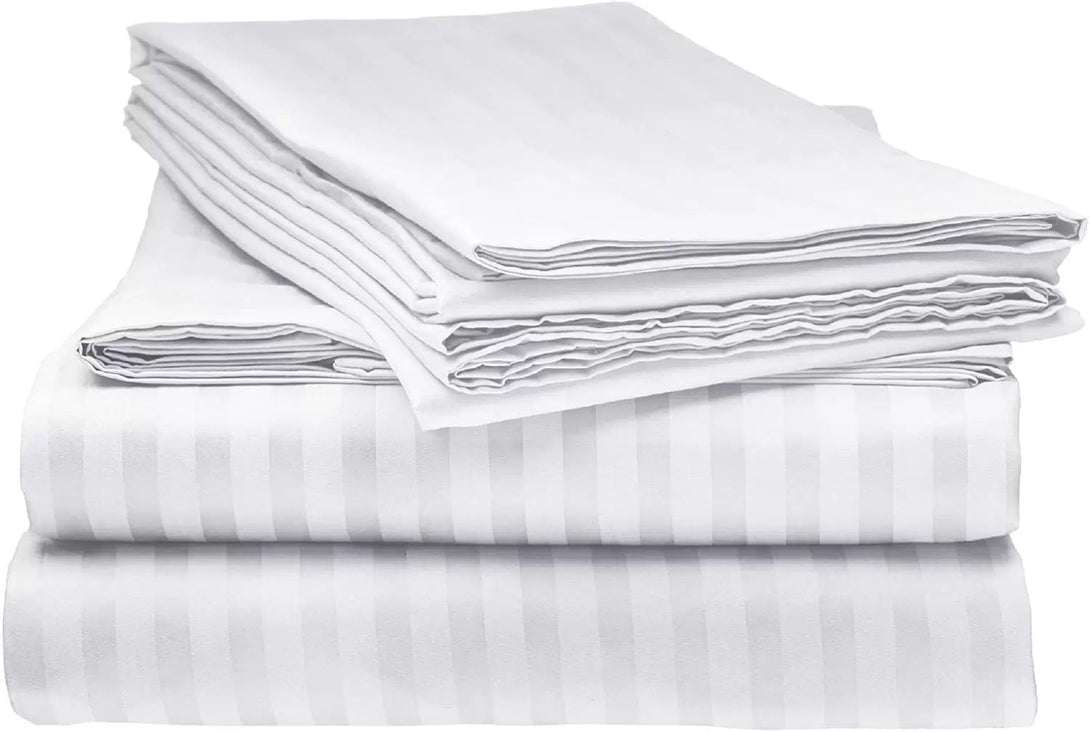 A neatly folded stack of BRIT DIAMOND Luxury 400 Thread Count Satin Stripe Bedding Duvet Sets, made from 100% Egyptian cotton, features subtle vertical stripes against a plain background.